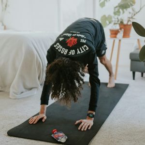 Woman exercising inside.