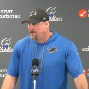 Dan Campbell speaking at a press conference