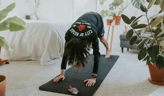 Woman exercising inside.