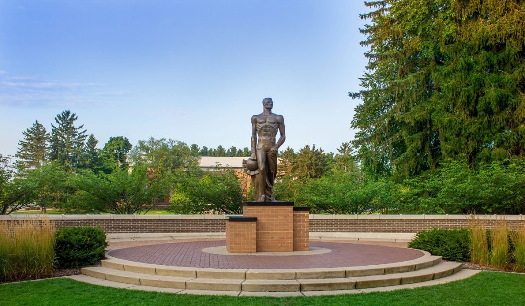 MSU Sparty amid blue skies.