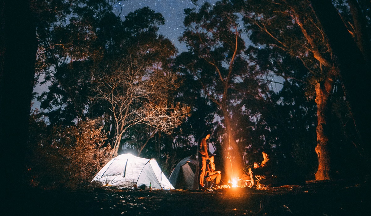 A camping site at nighttime. The experts at Reader's Digest have put together a list of the most beautiful camping sites in America, so if you're looking to travel this season, get these spots on your list.