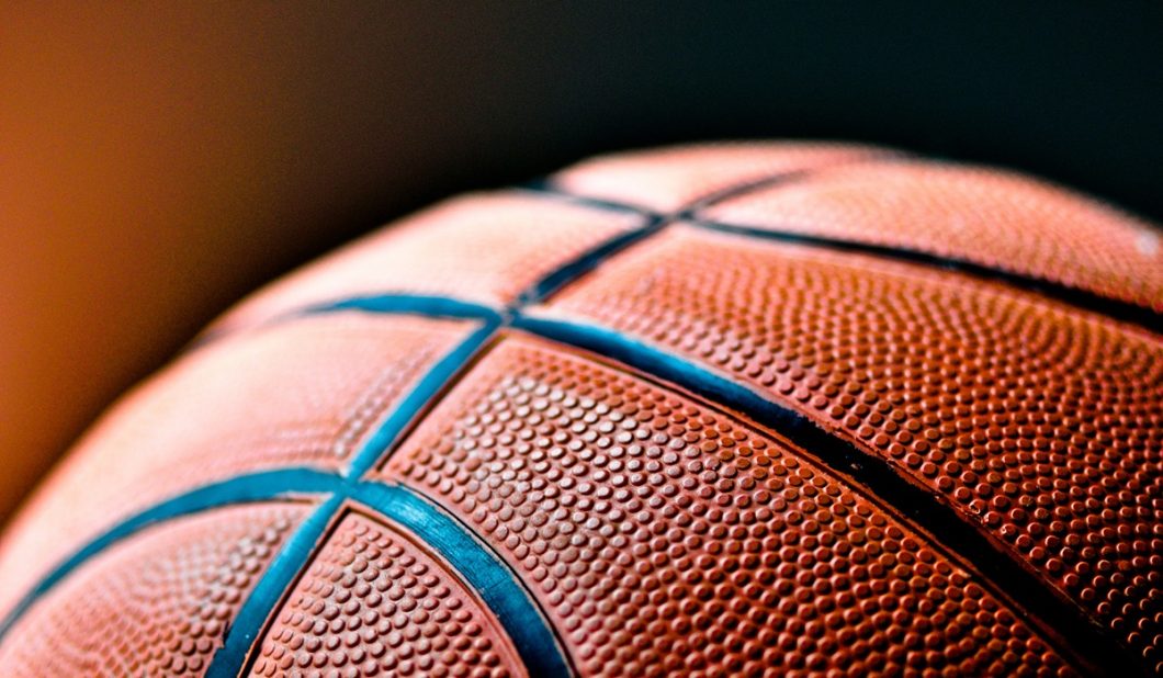 Top of a basketball. Caitlin Clark and Angel Reese are rivals on the court. Clark plays for the Indiana Fever, and Reese is on the Chicago Sky. But, the two will be teammates for one game. That's because both players are going to take on the Olympics Team USA.