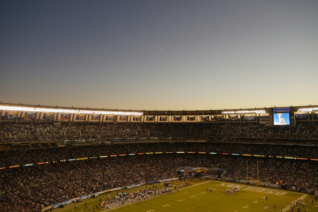 A stunning football field at night.