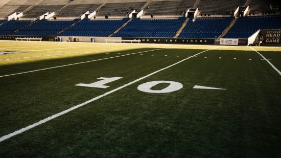 Football field at the 10-yard line.