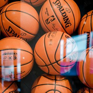 Basketball through the hoop.