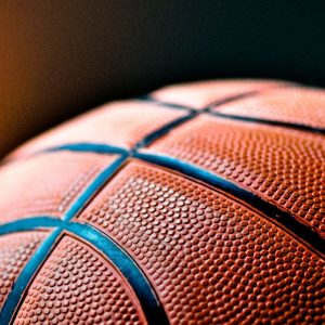 Basketball through the hoop.